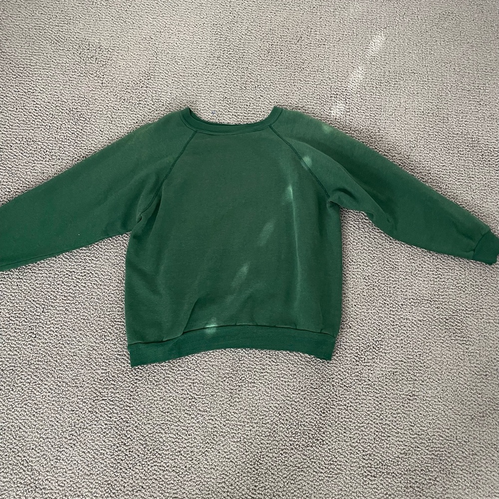 green sweatshirt